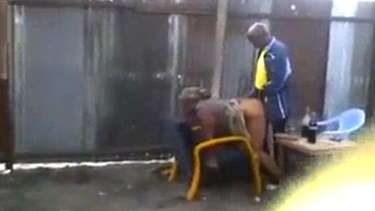 African man fucks woman in public