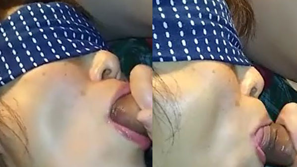 Girlfriend sucked a thick penis with a blindfold on her eyes.